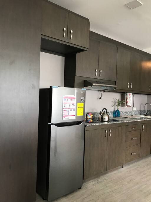 Fully equipped kitchen ready to use.