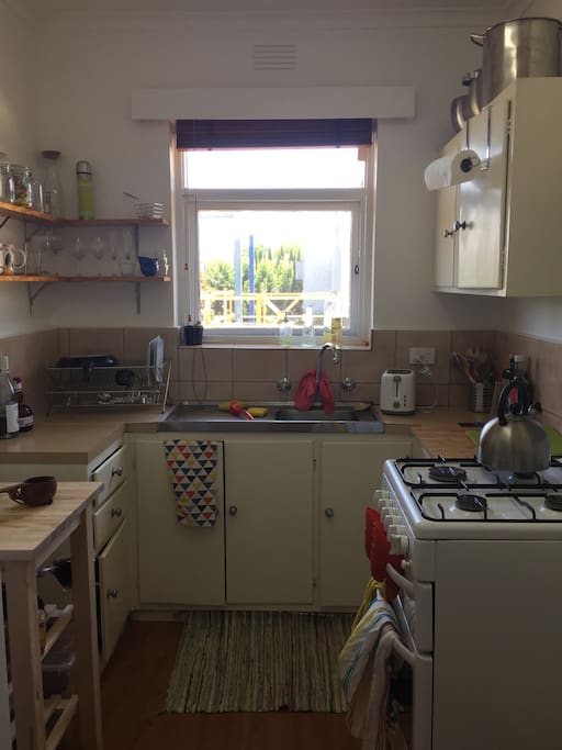 This is our homely kitchen. Gas stove, bbq, stove, toaster, blender, microwave. But no dishwasher unfortunately