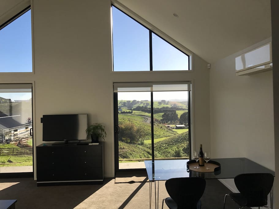 Private living/dinning room with separate entrance for guests and views of countryside