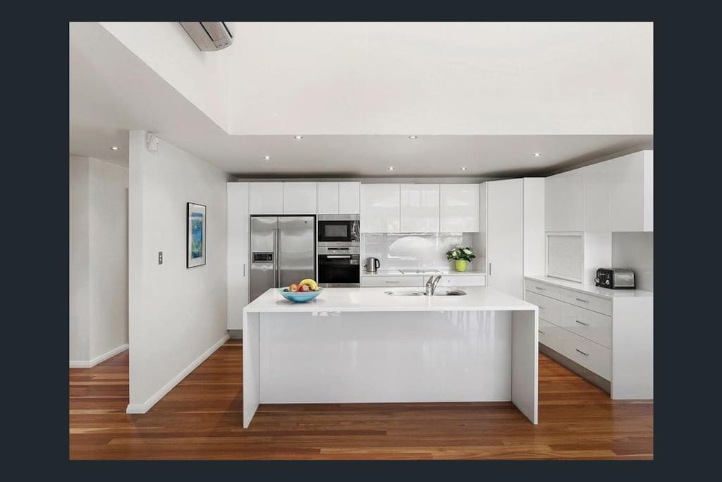 Modern kitchen with stainless steel appliances