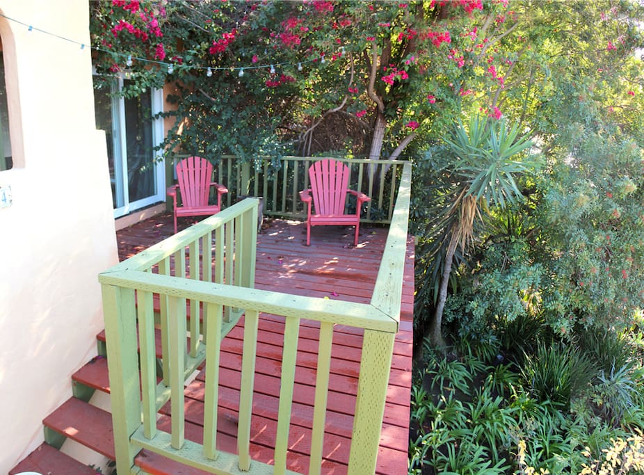 In a lush garden setting, a charming 1BR 1B California Spanish style duplex apt. Enjoy sunset cocktails on your private perch