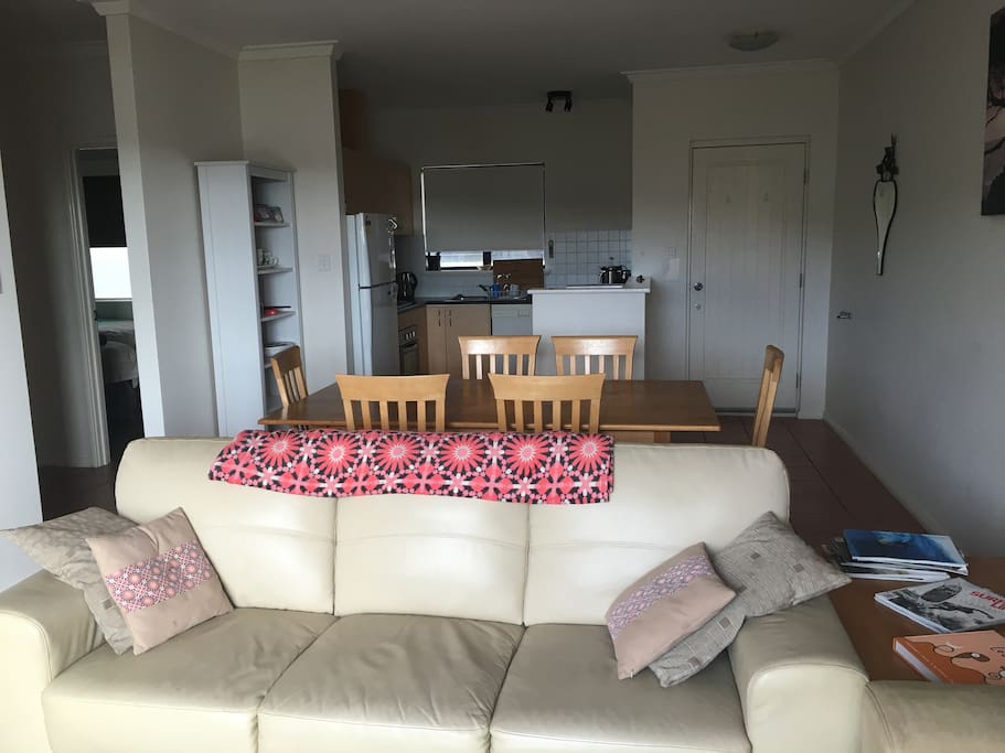 Open living area, kitchen, dining, lounge.