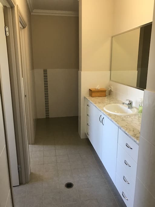 Large walk through vanity area, separate shower room, 2 separate toilets