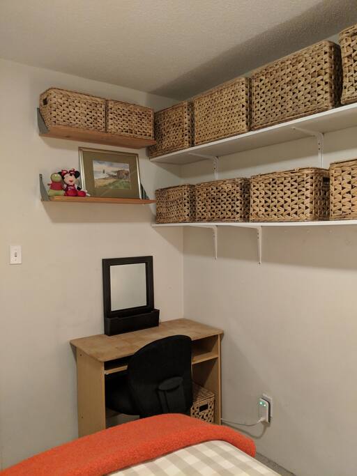 desk area in room for business and pleasure - also all those baskets are empty for your use