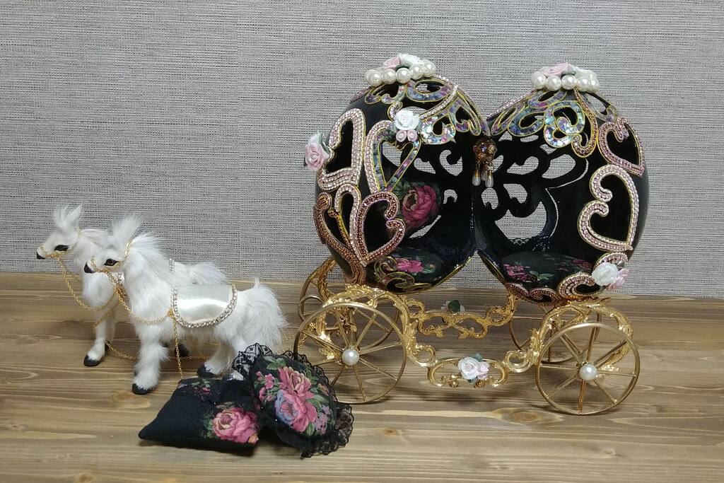Ostrich egg carriage.
