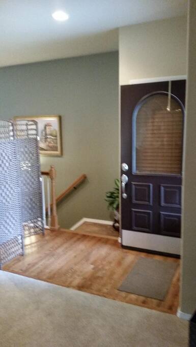 Entry way and stairs down to guest area.