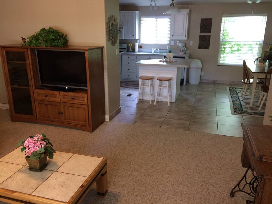 Living room opens to kitchen & dining