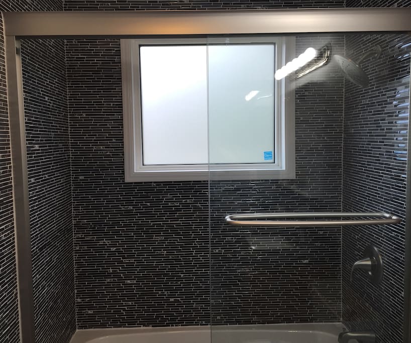New shower highlights the remodeled bathroom.