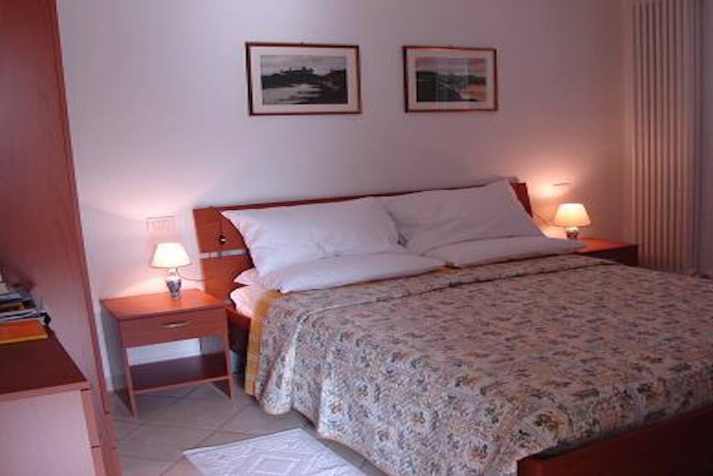 Slaapkamer van het tuinappartement