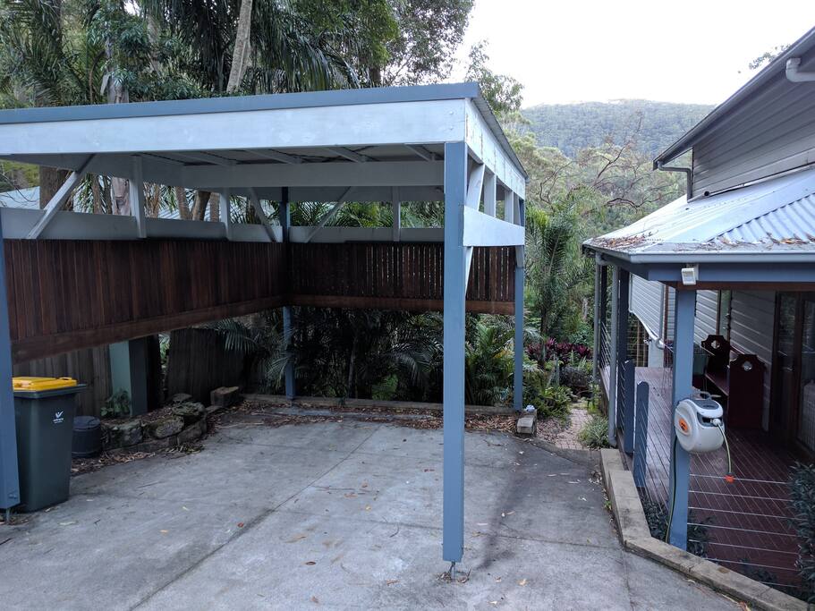 Guest carport, and pathway down to studio.