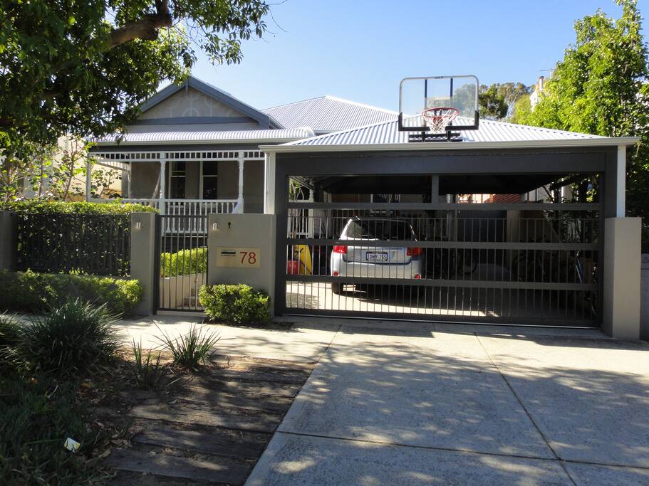 Front of the house with carport (guests can park 2 cars in front of our car port)