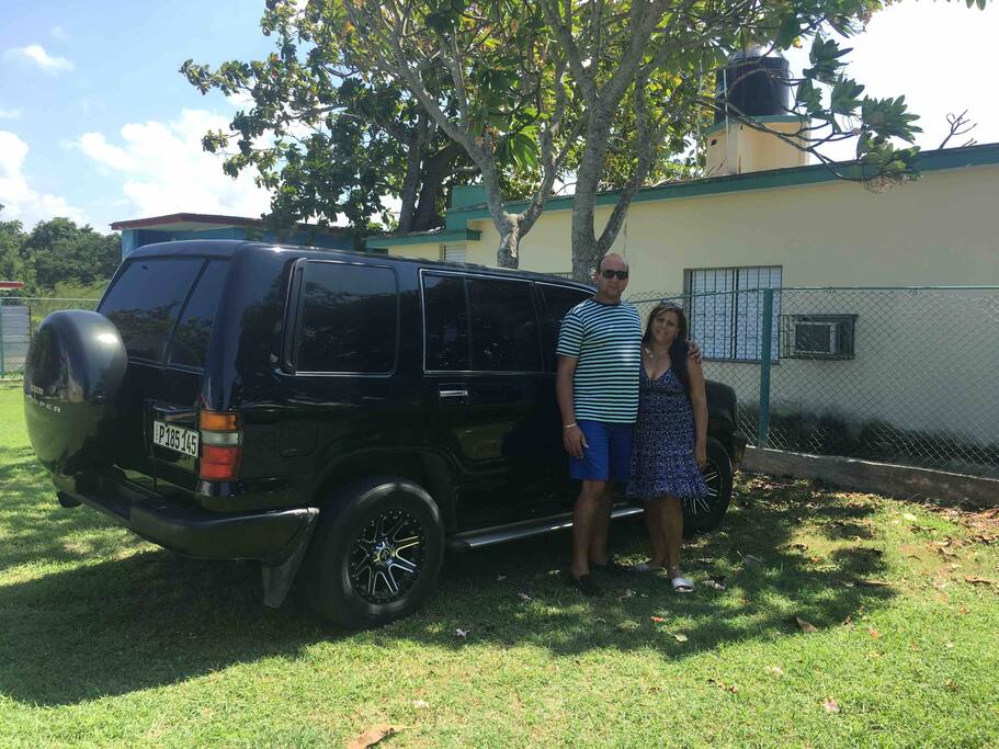 Your Host Pipo and Mayra and air conditioned car
