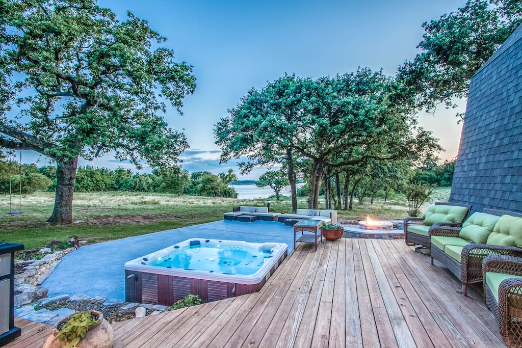Large outdoor deck and patio complete with gas grill and hot tub make this a perfect spot for your whole group to gather and spend time together.