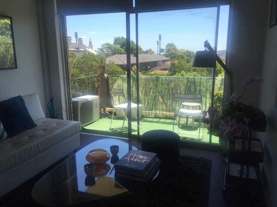 Enjoy the fresh air on the balcony.