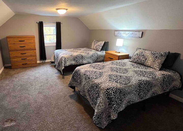 Bedroom 5 Upstairs-2 Twin beds with 32" Wi-Fi TV and blackout curtains.