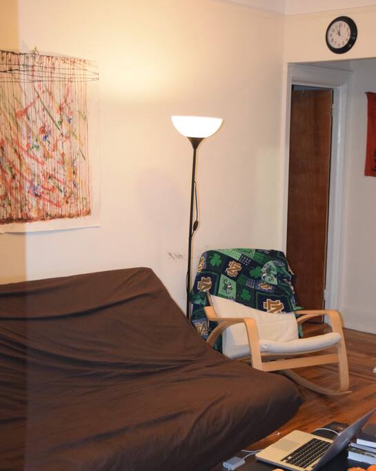 Ikea futon in the living room sleeps two