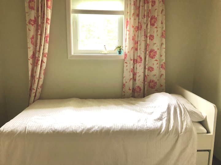 2nd Floor bedroom with twin bed that can be extended out to fit 2 twin mattresses