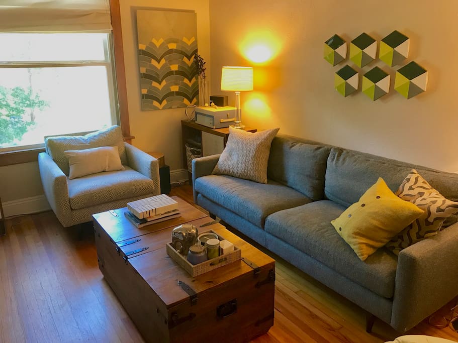 Living room with plenty of cozy places to sit and talk or watch a movie.