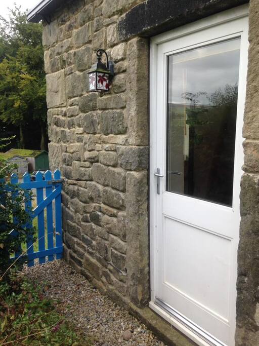 The blue gate leading the village car park