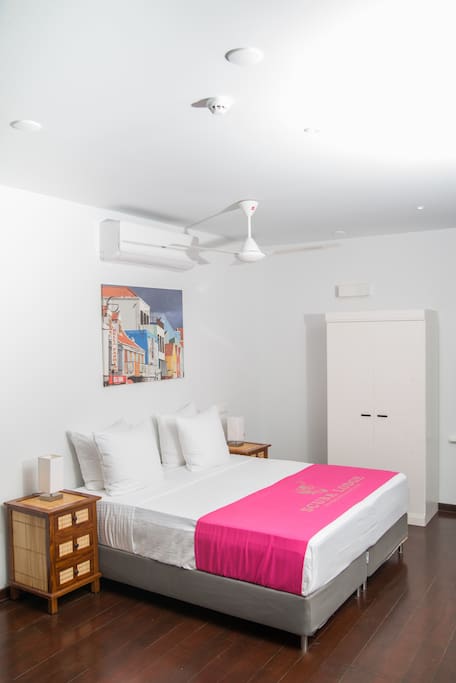 Modern bedroom in historic building.