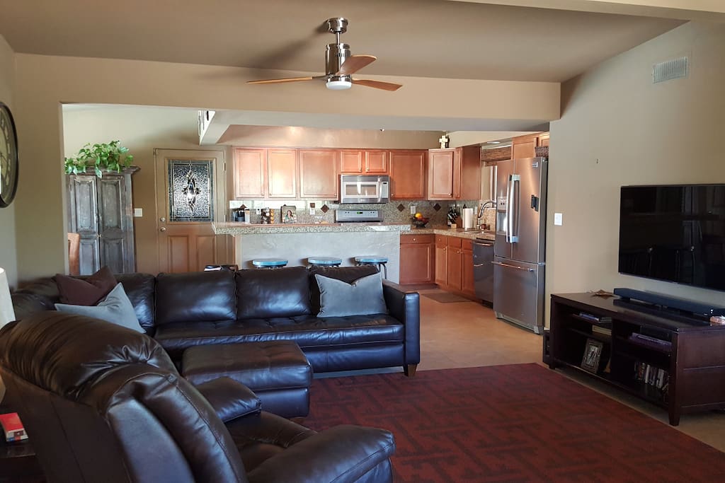 Great open floor connecting dining, kitchen, living and pool table