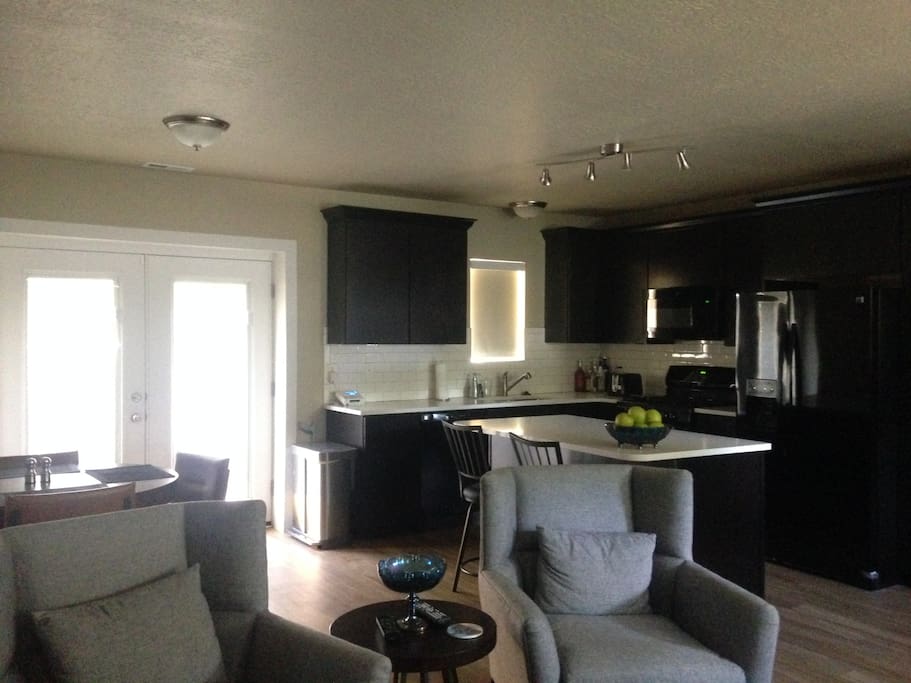 View of kitchen and dining area from living room