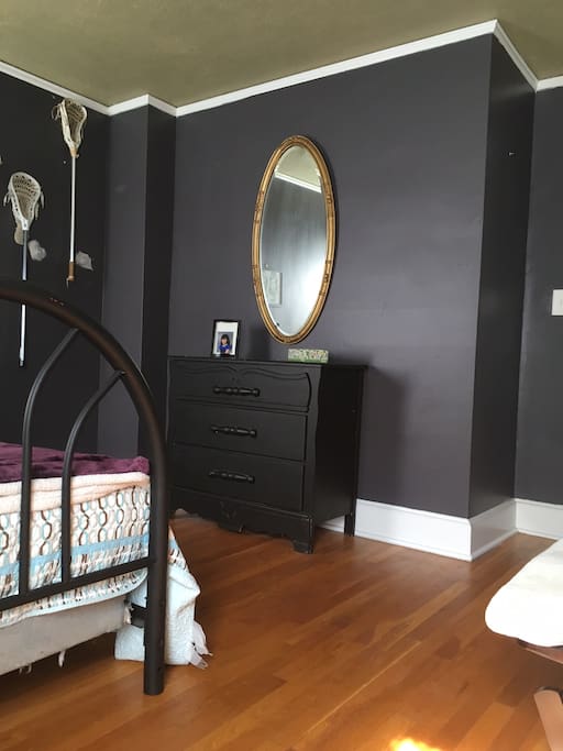 Dresser for clothes and a mirror.