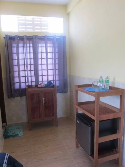 Air conditioning or ceiling fan to keep you cool, plus bar fridge for your convenience.