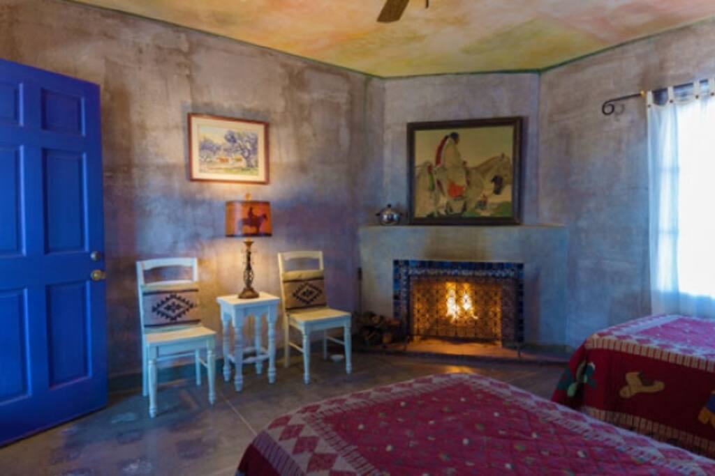 Fireplace with sitting area.