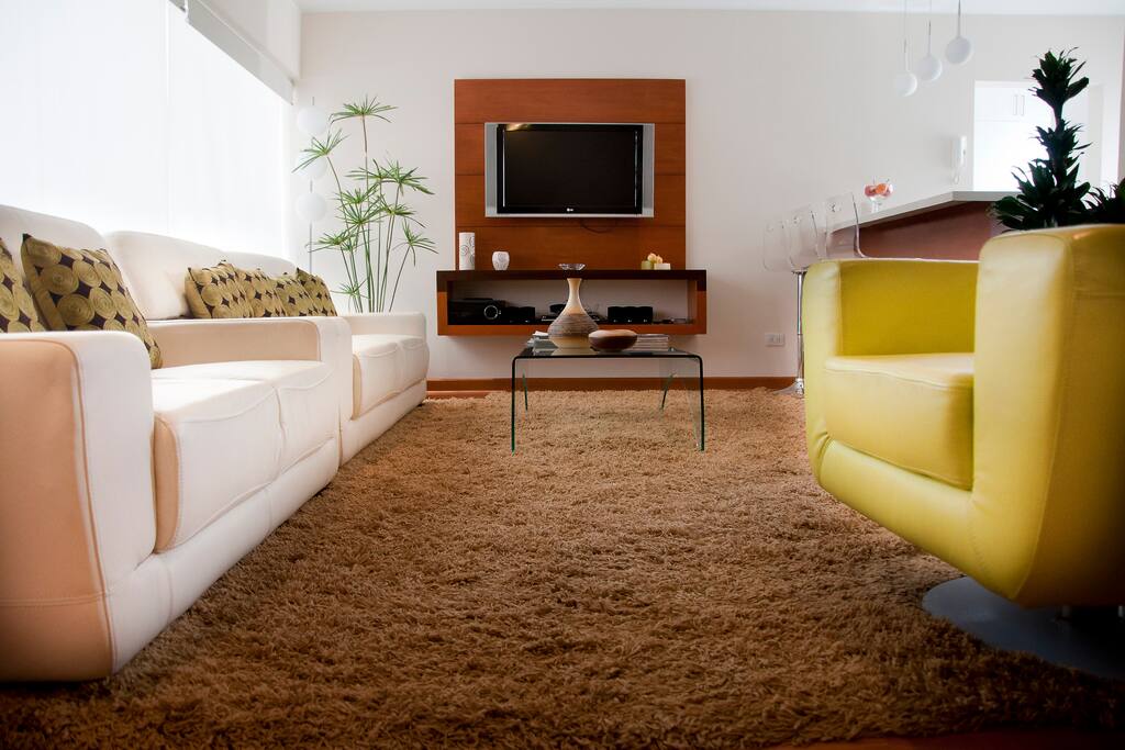 Sala conectada con kitchenette y cocina
