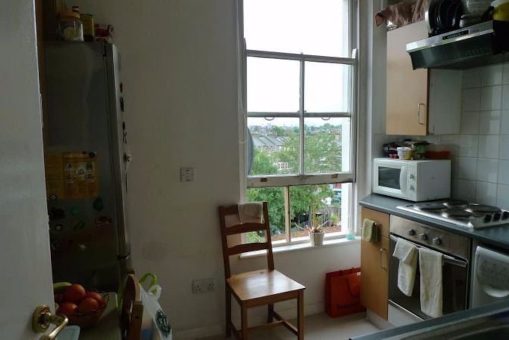 Our kitchen is fully equipped and has a lovely view.
