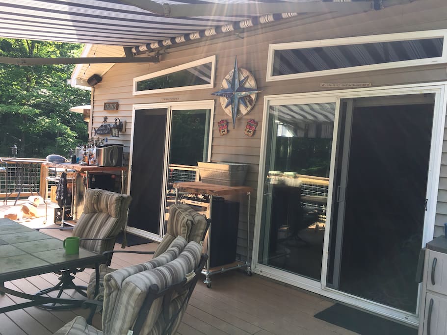 Double sliding glass doors that make the deck feel like part of the interior living space.