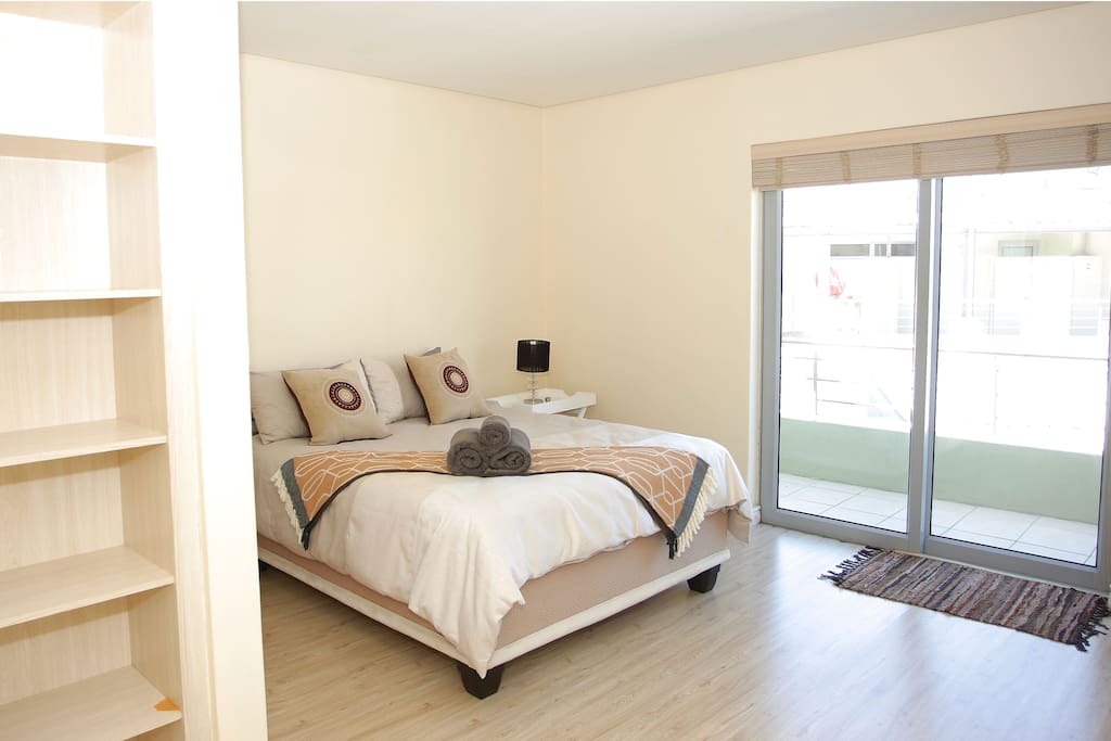 Spacious bedroom with queen size bed