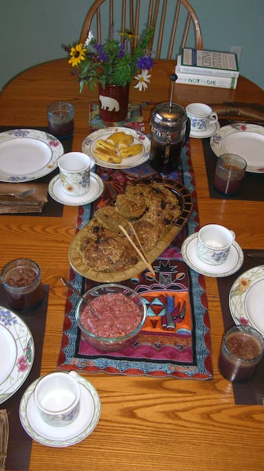 Signature breakfast; 21-ingredient oatmeal blueberry pancakes, six-organic fruit/berry with walnut compote for pancake topping, garden fresh smoothie, organic french press coffee