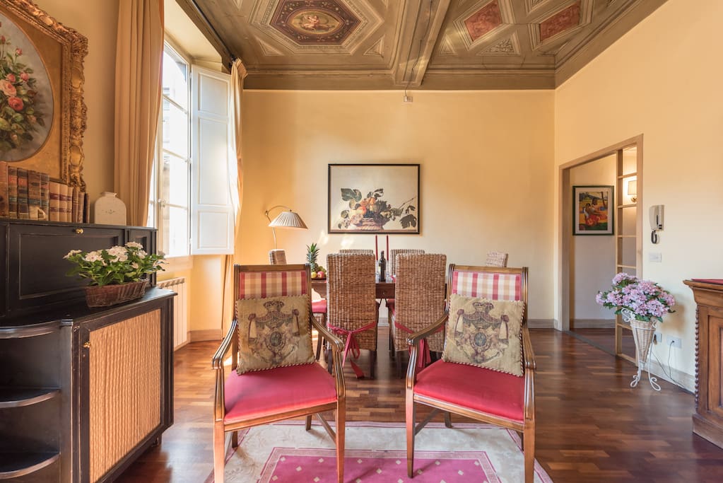 Living room, ceiling paints from 1200 a.C. World Heritage building, view historical center, A/C each room