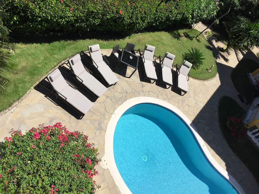Comfortable pool loungers to relax in the sun