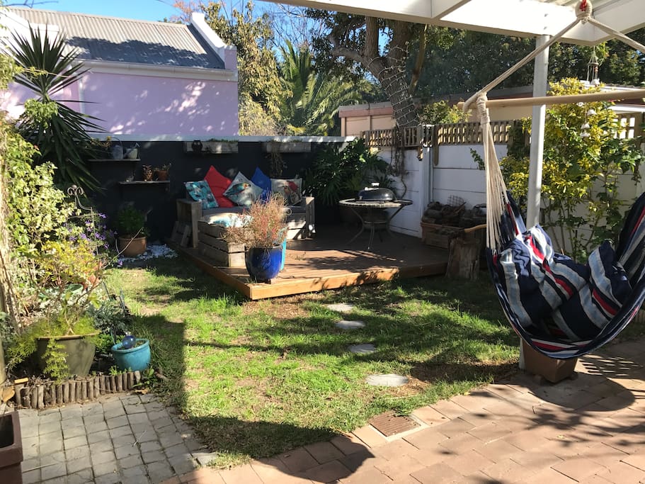 Back garden with deck and BBQ