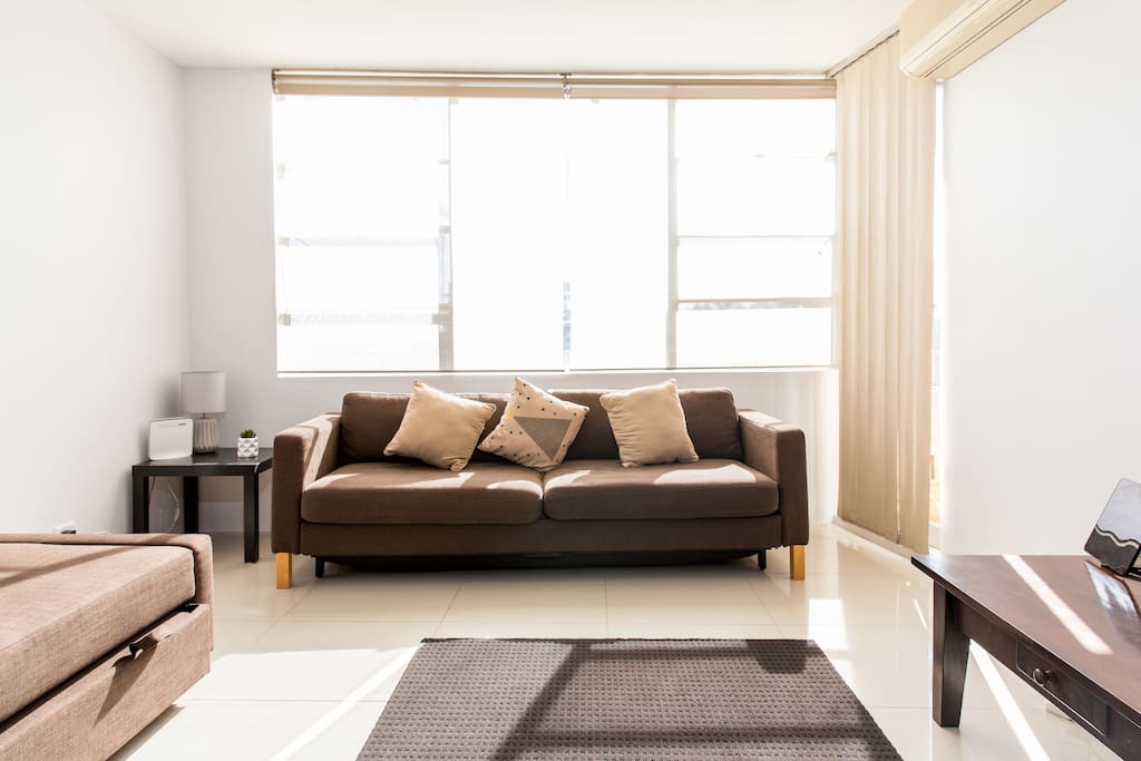Spacious lounge area with sofa beds