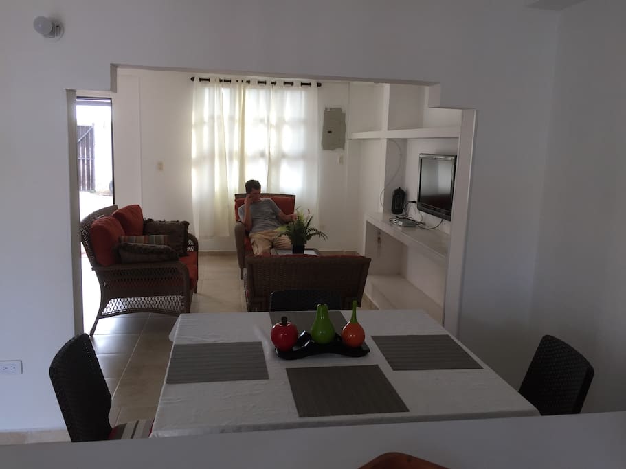 Living room with TV that guests have access to.