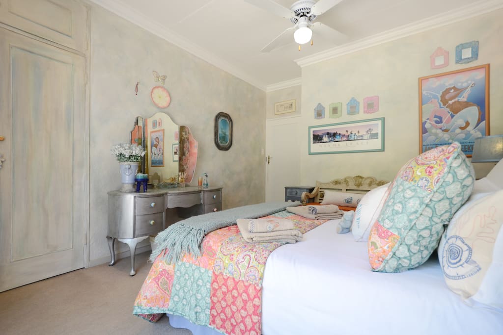 The Miami Room with French hand painted dressing table.