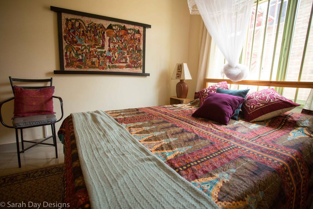 Room is decorated with African fabrics!