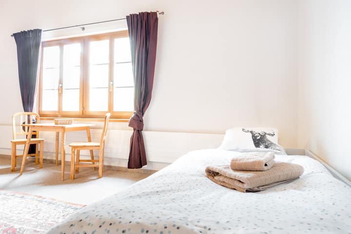 Big Space under the roof with 2 singles beds and..