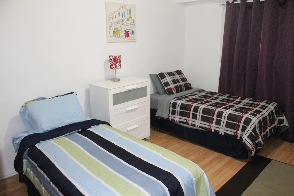 This Bedroom offers 2 single Bed and plenty of storage space is offered in the closet