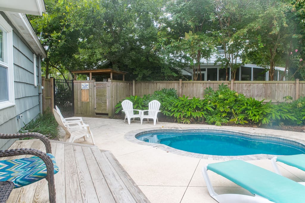 Private, saltwater pool with outdoor shower + lounge chairs