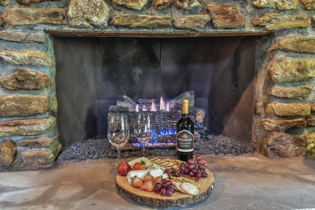 Stone gas fireplace for cool evenings in the mountains