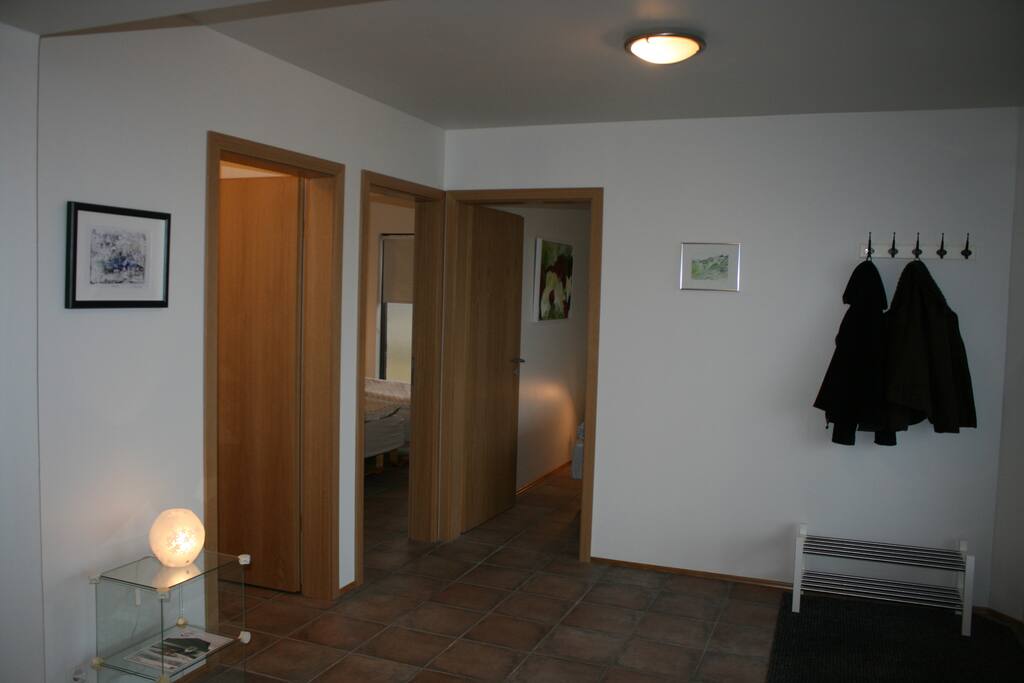 The entrance, the bedrooms and the bathroom