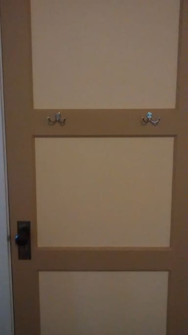 A thoughtful guest suggested "more hooks" so we added these to the closet door.