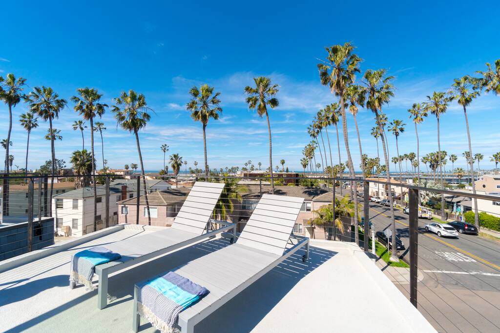 A rooftop deck offering amazing panoramic views of the ocean, bay, and city.