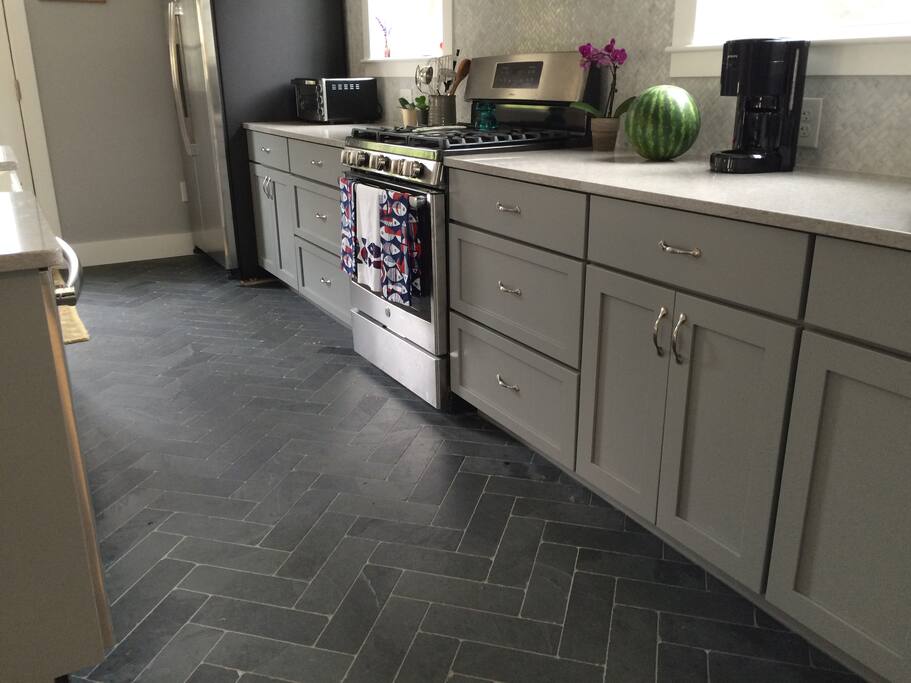 Kitchen has gas stove and open concept living