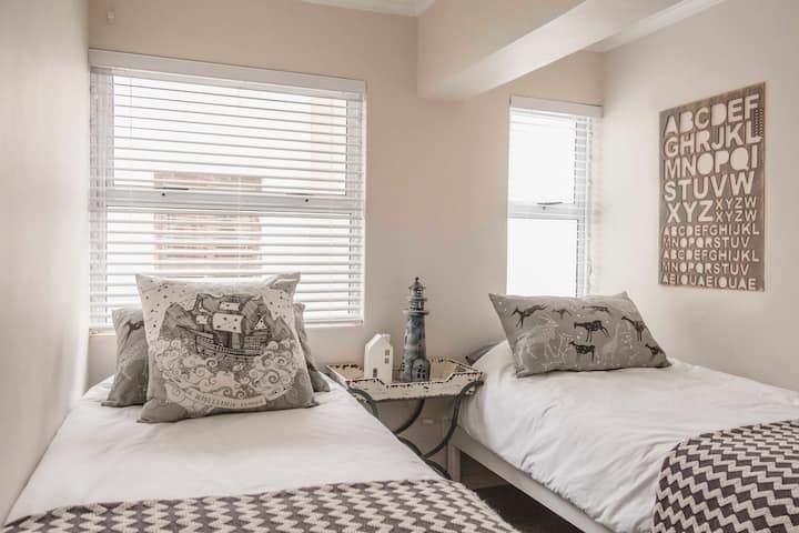 2nd Bedroom downstairs - 2 extra length single beds with warm blankets and lovely crisp linens.